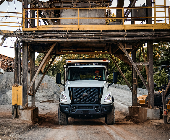 A Volvo VNX comfortably positioned at a construction site.