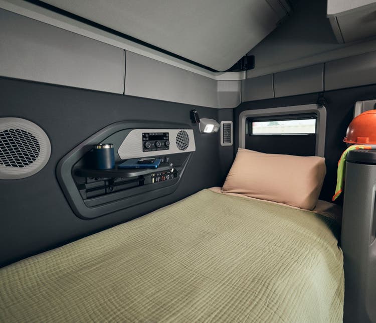 The inside of the Volvo VNX has a comfortable space for reading, relaxing, and winding down after a demanding day.