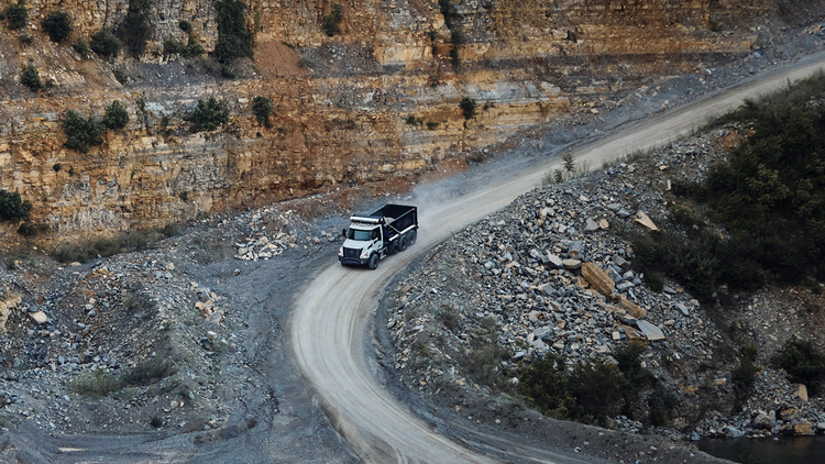 The Volvo VNX being driven on a rocky road.